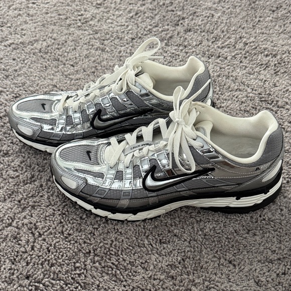 Nike Metallic Silver and White Athletic Shoes - Picture 2 of 4